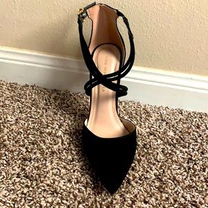 Woman’s black heels